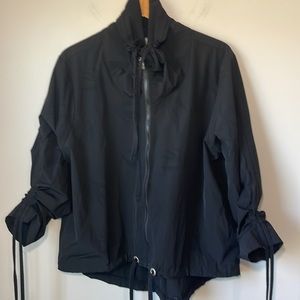 Nanette Lepore nylon perforation jacket with adjustable sleeve size Xl. sporty